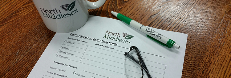branded north middlesex document and mug