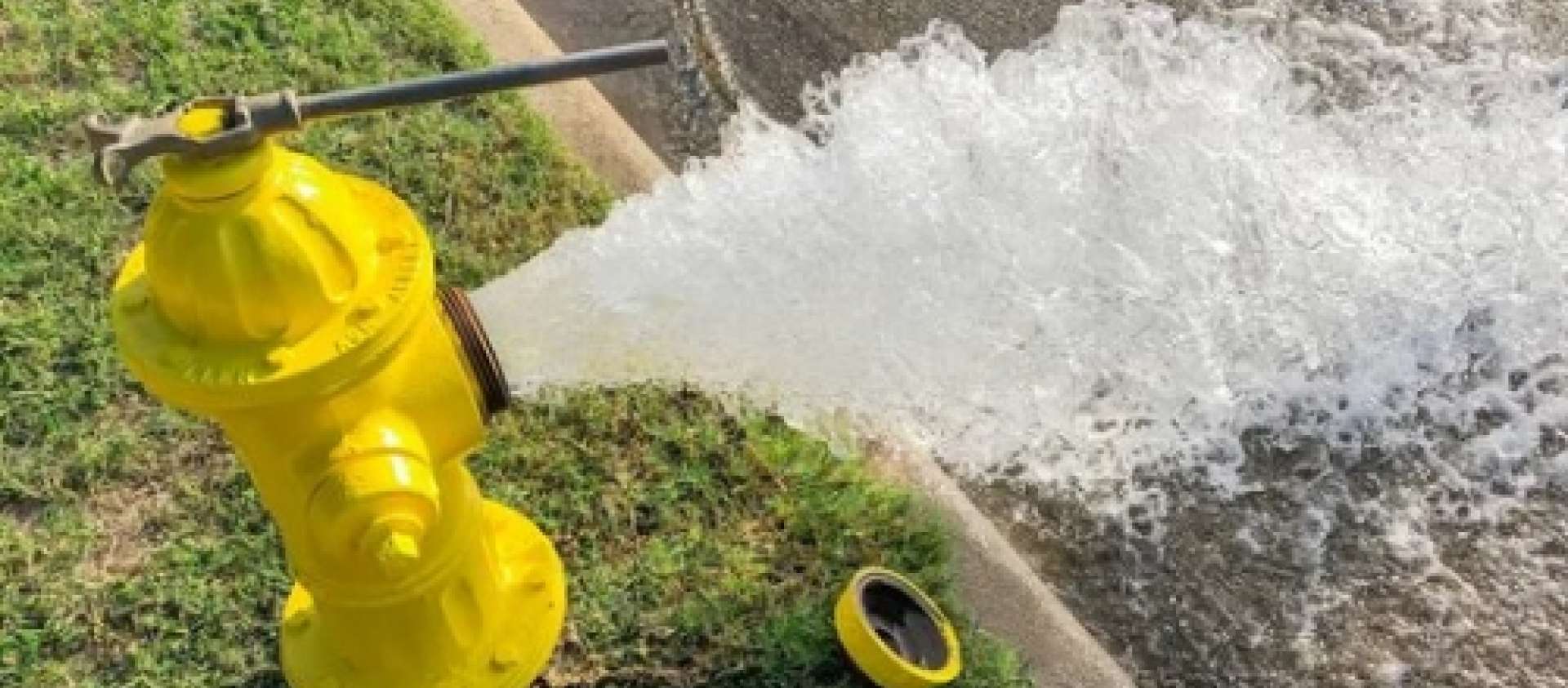 a fire hydrant flushing water